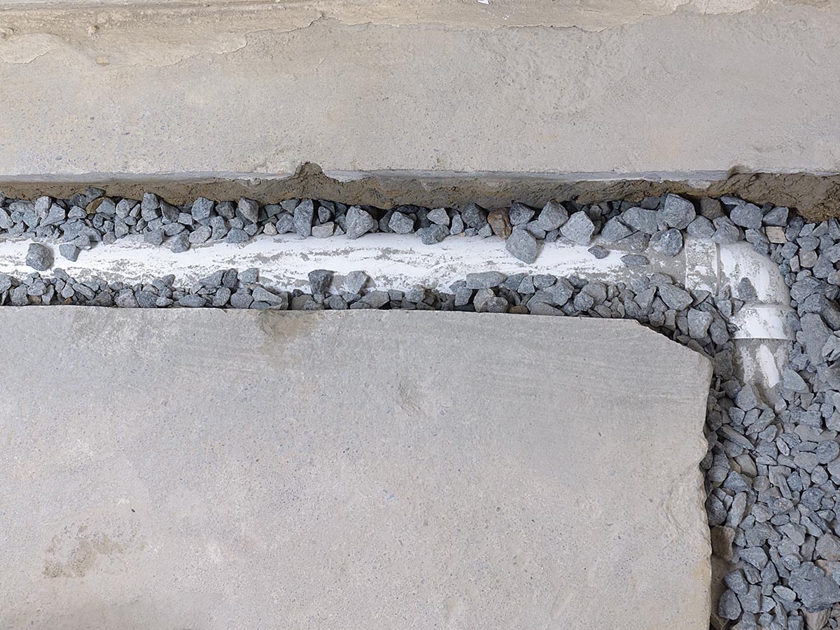 Installation of a french drain pipe