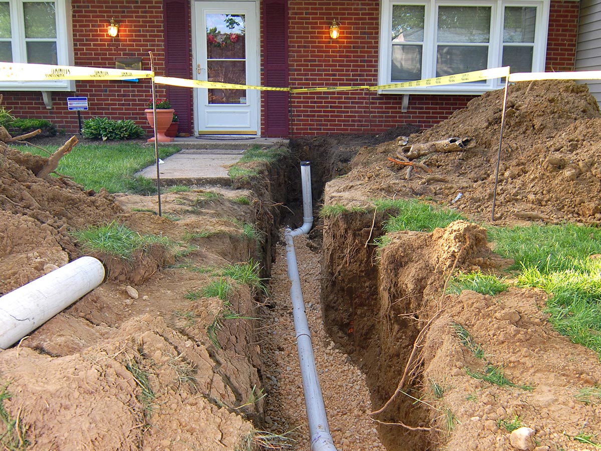French drain pipe in front yard